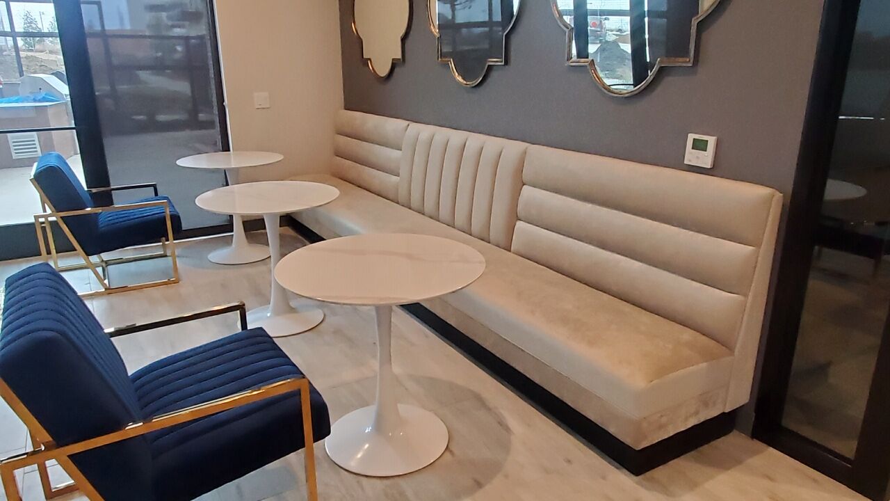 Custom restaurant booth seating with detailed upholstery